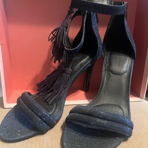 Elegant Black Heeled Sandals with Tassels